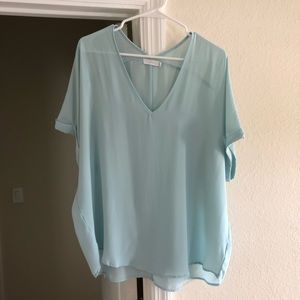Light blue top